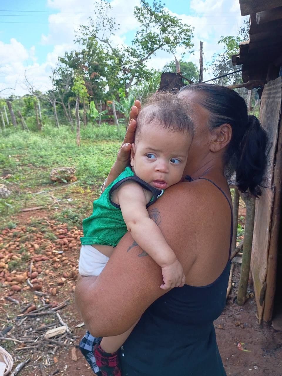 A mother and infant in a Cuban village